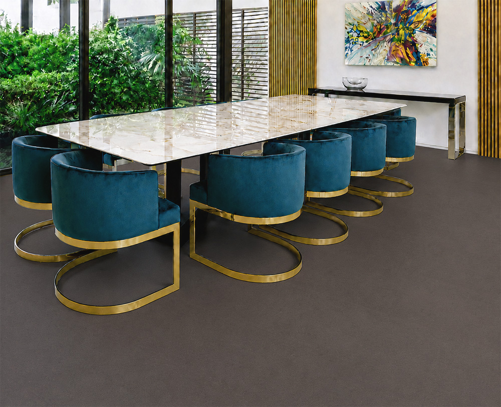 Night - 7/16" (11mm) - Swiss Real Cork Floating (FNig11) Night Swiss cork floor planks continue through a modern foyer with wooden stairs and glass doors.
