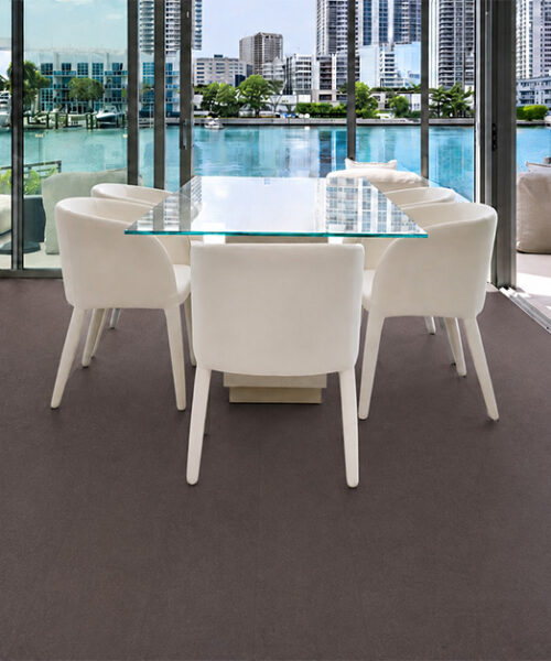 Night - 7/16" (11mm) - Swiss Real Cork Floating (FNig11) Night dark cork floor planks complement a white dining set overlooking a bright urban waterfront.
