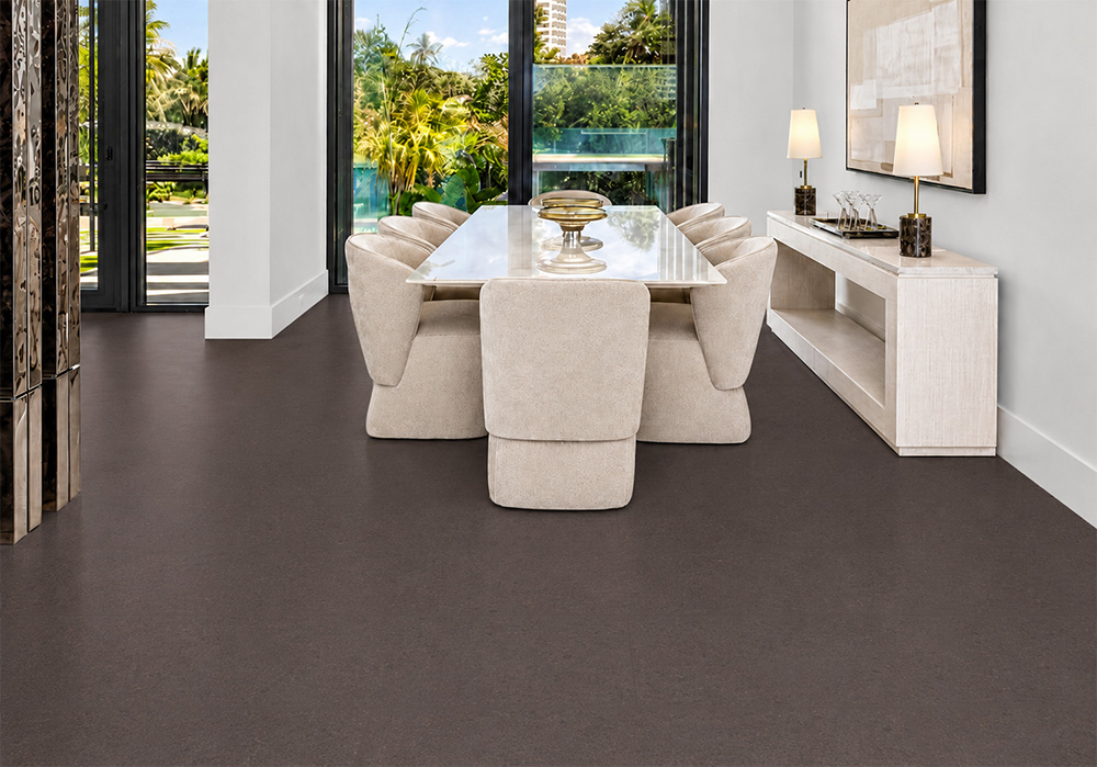 Night - 7/16" (11mm) - Swiss Real Cork Floating (FNig11) Night Swiss Real Cork Floating Flooring contrasts with cream dining chairs and lush garden views.