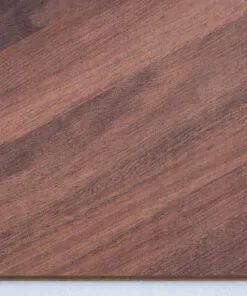Noble Chevron Swiss Design Cork Floating Flooring featuring a rich walnut wood look in a classic European chevron pattern, combining luxury design with the comfort of cork flooring.