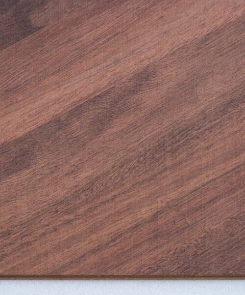 Noble Chevron Swiss Design Cork Floating Flooring featuring a rich walnut wood look in a classic European chevron pattern, combining luxury design with the comfort of cork flooring.