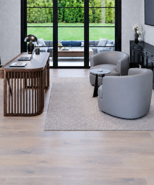 Canada's best Cork Flooring, Wall Tiles and Underlayment Nordic Oak light gray Natural Composite Flooring with subtle oak grain brightens an office lounge with curved chairs.