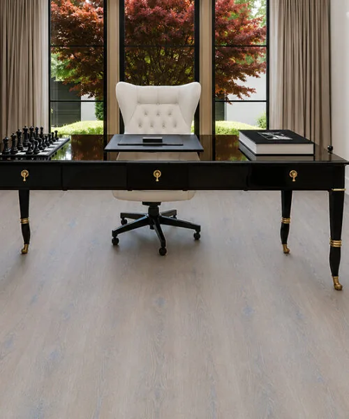 Nordic Oak - 3/8" (9.5mm) - Forna Natural Composite Flooring with Waterproof Hydrowood Core (NNorO9.5) Pale oak floating flooring throughout a modern office meeting room with executive furniture