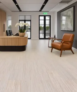 Vertical - 7/16" (11mm) - Swiss Real Cork Floating (FVtc11) Modern office reception space featuring Vertical Swiss cork flooring, natural wood textures, and minimalist décor for professional acoustic comfort.