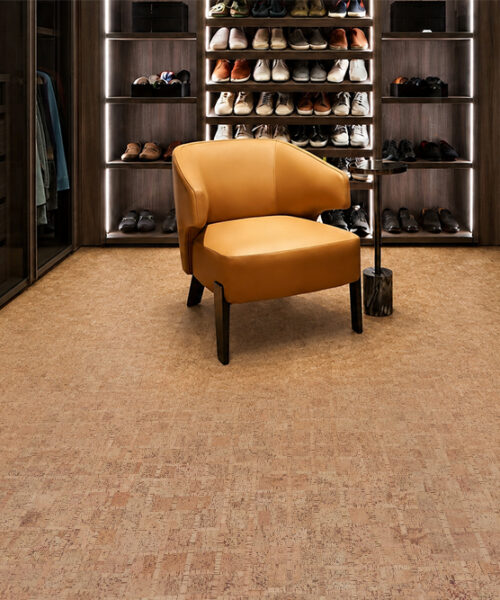 Quiet ParCork cork flooring in a light tan pattern covers a dark wood walk-in closet.