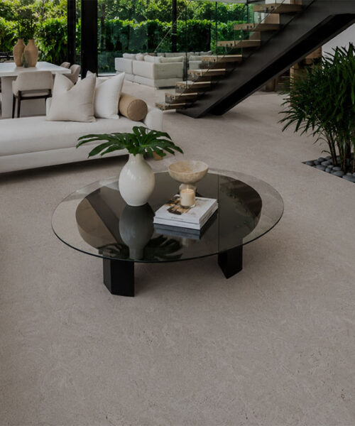 Spacious contemporary living room showcasing Porto Mist cork flooring with seamless natural cork texture