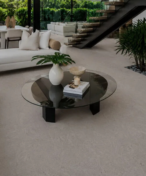 Spacious contemporary living room showcasing Porto Mist cork flooring with seamless natural cork texture