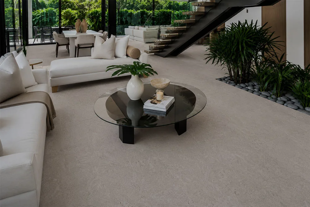 Porto Mist - 7/16" (11mm) - Swiss Real Cork Floating (FPM11) Spacious contemporary living room showcasing Porto Mist cork flooring with seamless natural cork texture