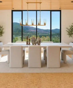 Bright dining space with floor-to-ceiling windows and natural Quodro Swiss cork flooring that adds warmth and comfort to a modern minimalist home.