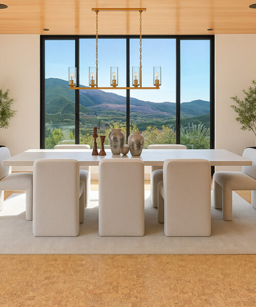 Bright dining space with floor-to-ceiling windows and natural Quodro Swiss cork flooring that adds warmth and comfort to a modern minimalist home.