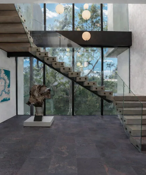 Rainbow Slate Real Stone Flooring – Modern Stair area Entry with Glass Railings and Dark Stone Flooring