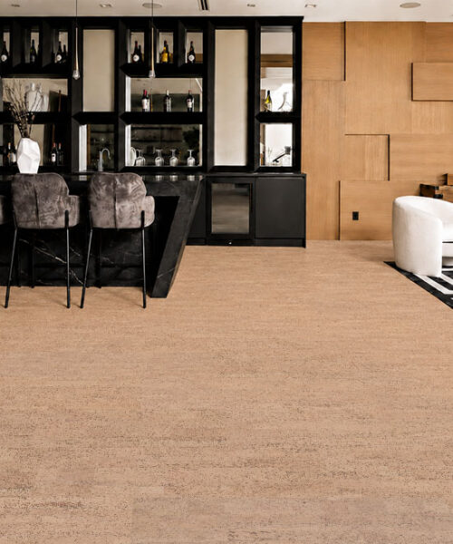 Rhythm – 7/16″ (11mm) – Swiss Real Cork Floating (FRhy11) Rhythm light beige cork floor planks cover a stylish home bar and lounge with geometric décor.