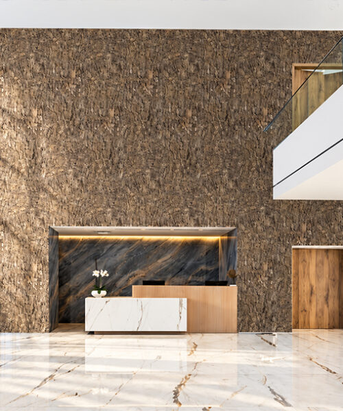 Roccia HDF - 1 7/64"(28mm) - Cork Wall Panels (WRocc28) Roccia 28mm 3D natural cork wall panels with rugged stone-like brown texture covering a tall feature wall in a modern commercial lobby with marble flooring