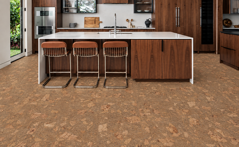 Rococo - 1/2" (12mm) - Cork Floating (FRoco12) Warm Rococo floating cork flooring surrounds a walnut kitchen island with three leather counter stools.