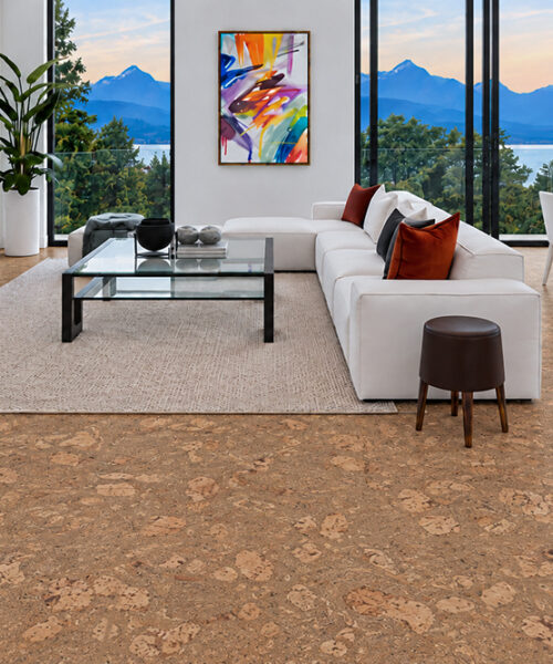 Rococo - 1/2" (12mm) - Cork Floating (FRoco12) Rococo marble-look cork flooring in caramel brown connects a mountain-view lounge and dining area.