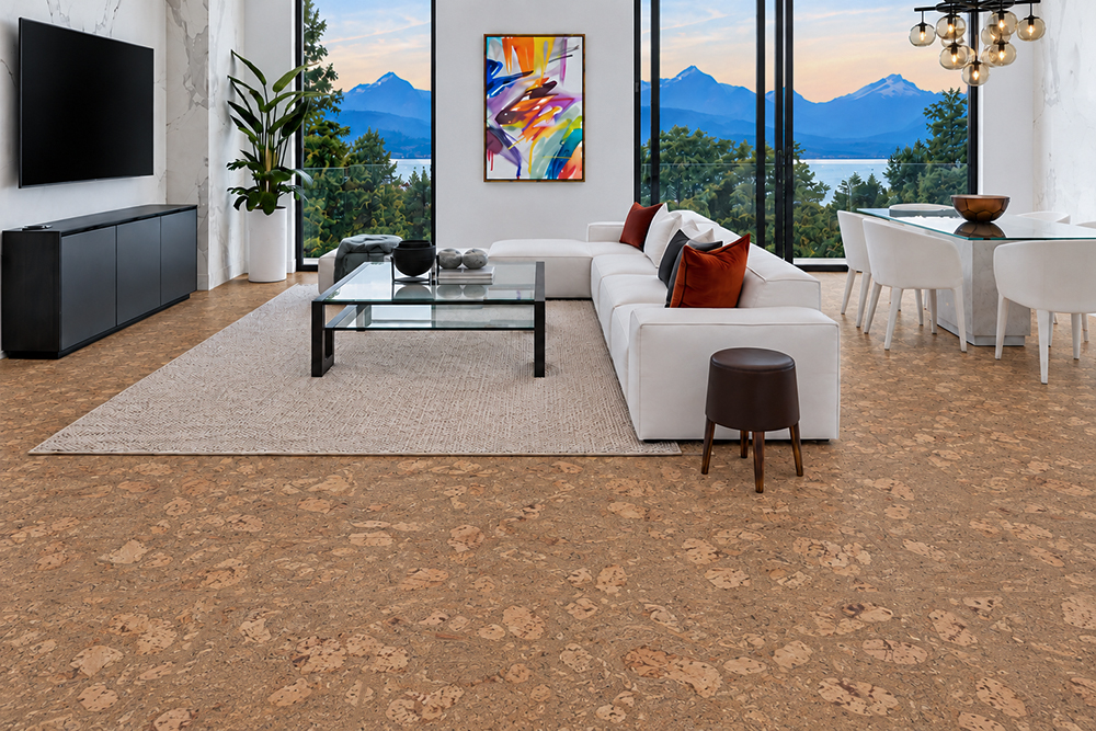 Rococo - 1/2" (12mm) - Cork Floating (FRoco12) Rococo marble-look cork flooring in caramel brown connects a mountain-view lounge and dining area.