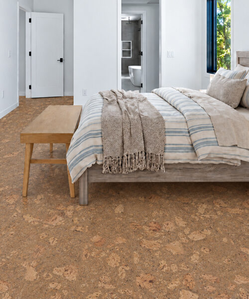 Rococo - 1/2" (12mm) - Cork Floating (FRoco12) Rococo 12mm floating cork flooring with natural amber pattern creates a comfortable contemporary bedroom.