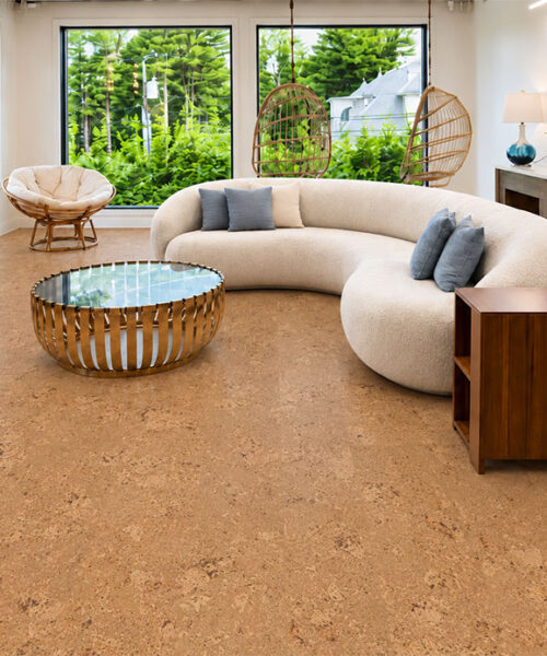Salami - 1/2" (12mm) - Cork Floating (FSal12) Warm Salami natural cork flooring surrounds a cream sectional, hanging chairs, and modern fireplace.