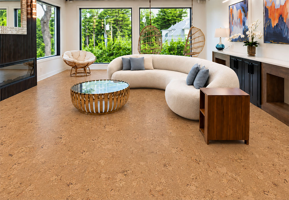 Salami - 1/2" (12mm) - Cork Floating (FSal12) Warm Salami natural cork flooring surrounds a cream sectional, hanging chairs, and modern fireplace.