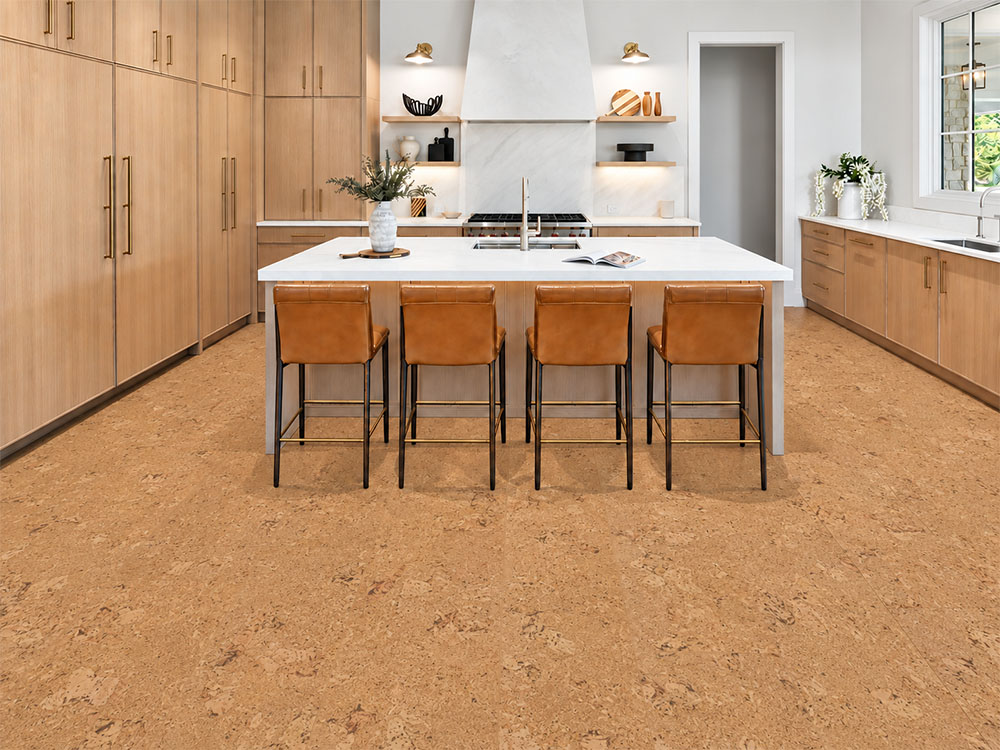 Salami - 1/2" (12mm) - Cork Floating (FSal12) Salami gold-oak cork floor planks ground a bright kitchen with wood cabinets and four counter stools.