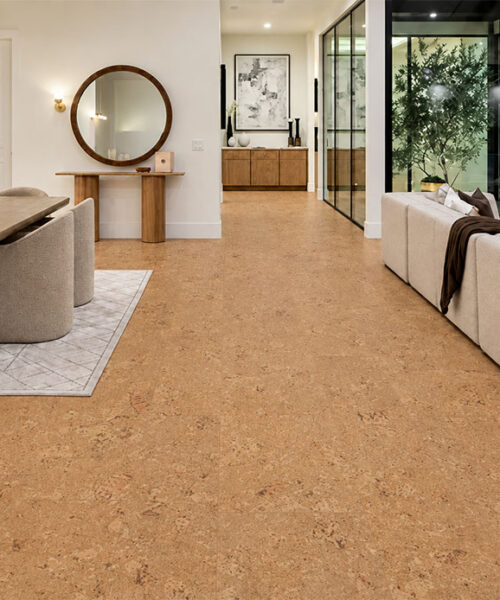Salami - 1/2" (12mm) - Cork Floating (FSal12) Warm Salami cork flooring connects a contemporary dining area and living room beside glass courtyard walls.
