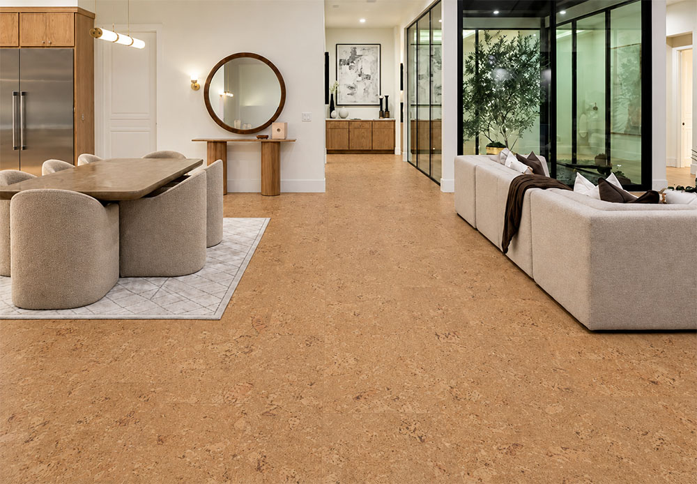 Salami - 1/2" (12mm) - Cork Floating (FSal12) Warm Salami cork flooring connects a contemporary dining area and living room beside glass courtyard walls.