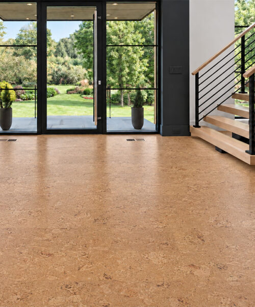 Salami - 1/2" (12mm) - Cork Floating (FSal12) Salami 12mm floating cork flooring covers a garden-facing foyer with glass doors and open wood staircase.