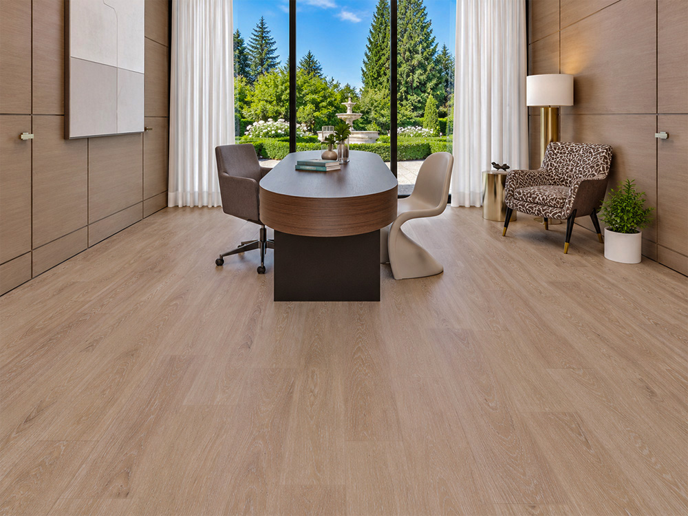 Sandstorm - 7/16" (11mm) - Swiss Design Cork Floating (FSan11) Light beige Sandstorm cork floating floor with natural wood grain in an elegant office featuring a curved desk and floor-to-ceiling garden window.