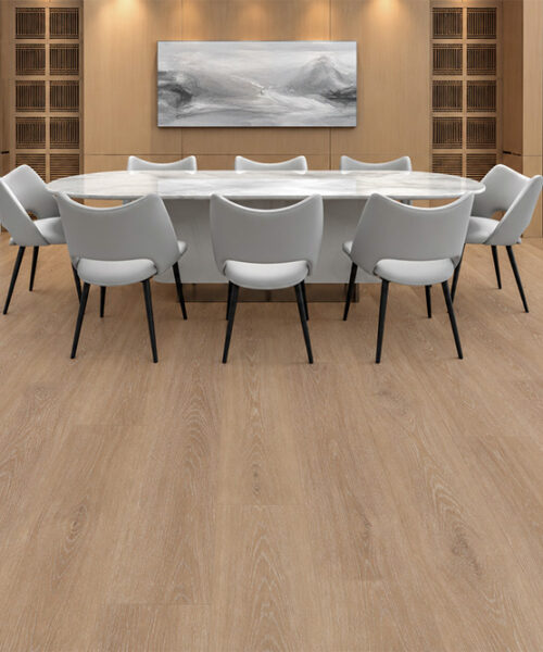 Sandstorm - 7/16" (11mm) - Swiss Design Cork Floating (FSan11) Comfortable Sandstorm light-beige cork floor in a formal dining room with a marble table, white chairs, wood cabinetry, and abstract artwork.