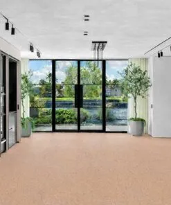 Seaside - 7/16" (11mm) - Swiss Real Cork Floating (FSea11) Spacious contemporary kitchen and living area with Seaside cork flooring, showcasing durability and natural texture.