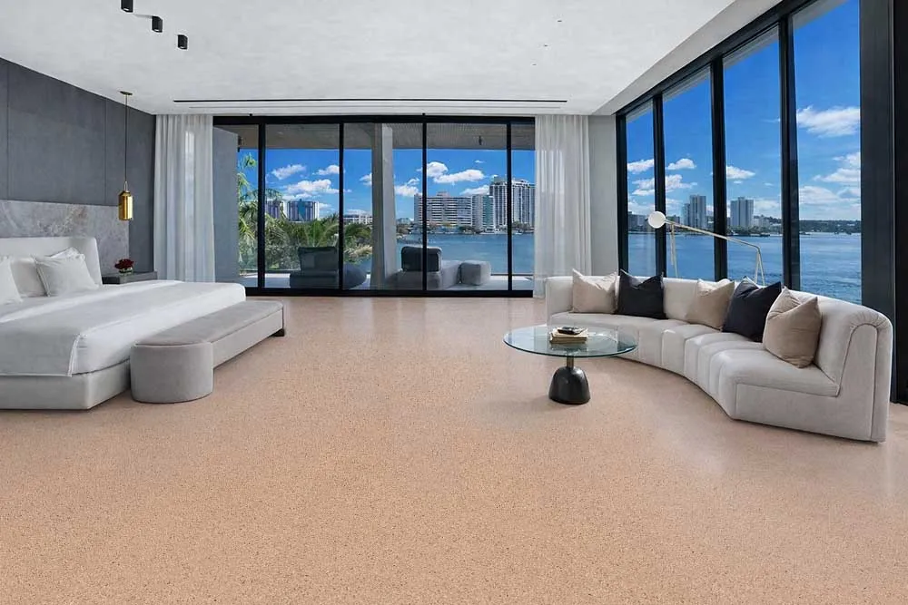 Seaside - 7/16" (11mm) - Swiss Real Cork Floating (FSea11) Seaside cork flooring in a luxury waterfront bedroom offering natural warmth, quiet comfort, and modern coastal design.