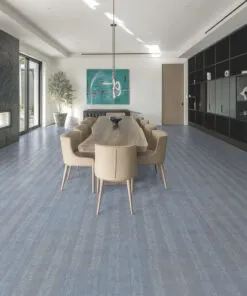 Serpent Luxe – 13/32” (10.5mm) – Swiss Leather Flooring (LSL10.5) Contemporary dining space with Serpent Luxe Swiss leather floating floor, sleek patterned planks enhancing a modern wood dining set.