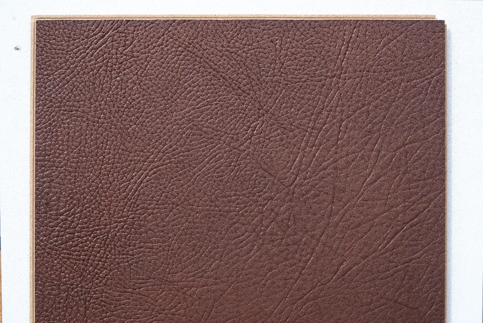 Chestnut – 3/8” (9.5mm) – Swiss Leather Flooring (LChsnt9.5) Chestnut Swiss Real Leather Flooring featuring a rich brown genuine leather surface with authentic leather grain texture and luxurious Swiss-engineered construction.