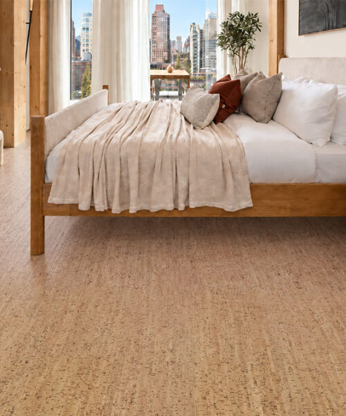 Silver Birch - 5/16" (8mm) - Cork Glue Down Tile (GSB8) Silver Birch cork flooring in natural gold tones complements a city-view bedroom with a wood bed.