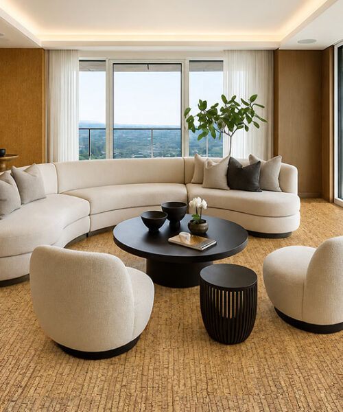 Sisal - 1/2" (12mm) - Cork Floating (FSi12) Sisal cork flooring in a minimalist living room with white modern furniture, wood accent wall panels, and large sliding glass doors