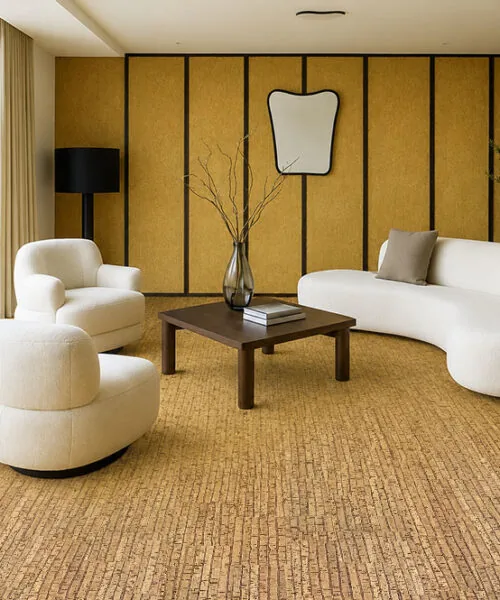 Sisal cork flooring in a minimalist living room with white modern furniture, wood accent wall panels, and large sliding glass doors. If you want a second set of ALT text (shorter/longer, more keyword-heavy, Pinterest-optimized, etc.), I can create those too! I prefer this response