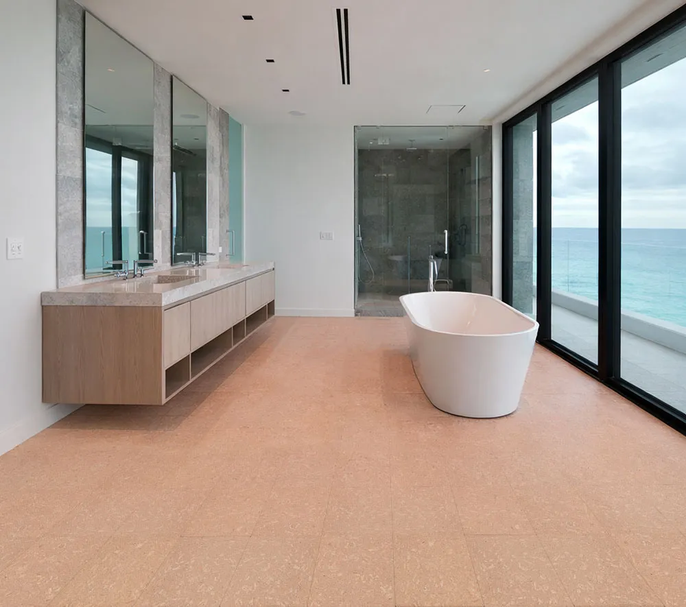Solara solid massive glue down cork tiles in a spa-style bathroom, offering a warm, waterproof cork floor when properly sealed.
