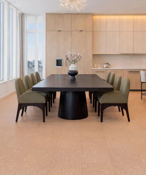 Solara solid massive glue down cork tiles enhancing an open dining space with soft, quiet, and sustainable cork flooring