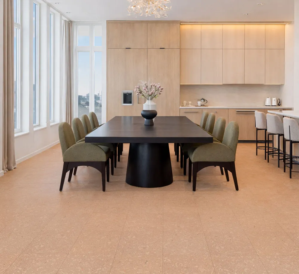 Solara solid massive glue down cork tiles enhancing an open dining space with soft, quiet, and sustainable cork flooring