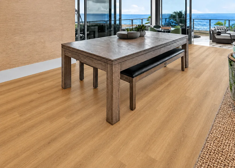 Spanish Cedar - 13/32" (10.5mm) - Design Cork Floating (FSC10.5) Spanish Cedar natural wood-look cork flooring in a waterfront living room with floor-to-ceiling windows.
