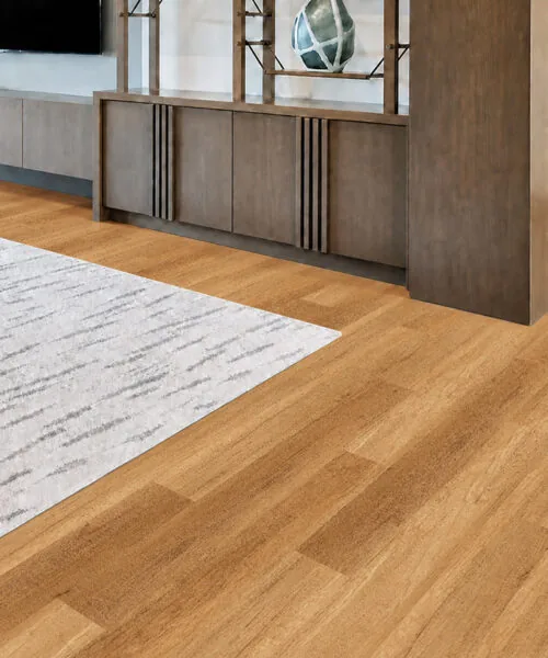 Spanish Cedar - 13/32" (10.5mm) - Design Cork Floating (FSC10.5) Spanish Cedar medium-brown cork plank flooring with a linear grain pattern in a modern living room.