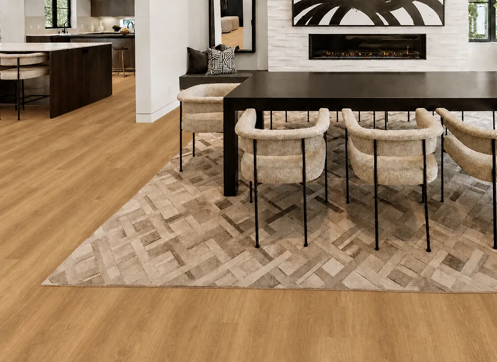 Spanish Cedar - 13/32" (10.5mm) - Design Cork Floating (FSC10.5) Spanish Cedar natural wood-grain cork flooring in an open-plan dining room with a modern fireplace.