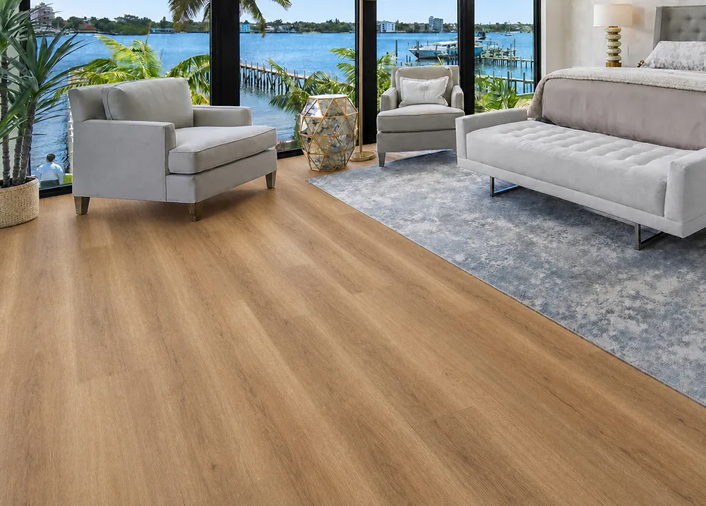 Spanish Cedar - 13/32" (10.5mm) - Design Cork Floating (FSC10.5) Spanish Cedar golden-brown cork floating flooring with a natural wood-grain pattern in an ocean-view dining room