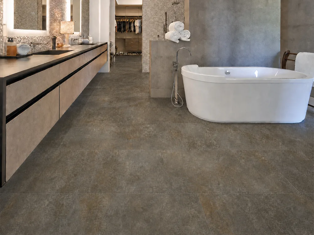 Sunlit Stone - 19/64" (7.5mm) - Swiss Techslate (MSunSt7.5) aterproof brown-gray Sunlit Stone Techslate floor in a modern spa bathroom with a white soaking tub