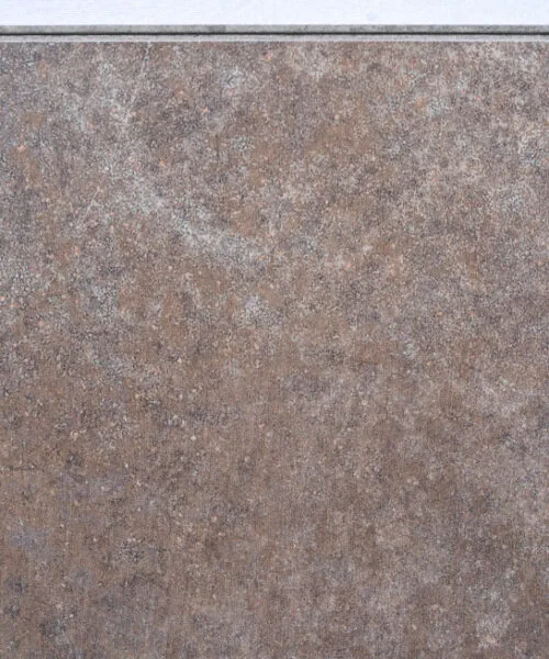 Sunlit Stone Swiss Techslate flooring featuring warm bronze and grey stone tones with a weathered slate appearance, creating a sophisticated natural stone look for modern and rustic interiors