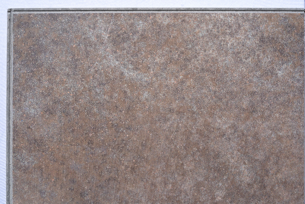 Sunlit Stone - 19/64" (7.5mm) - Swiss Techslate (MSunSt7.5) Sunlit Stone Swiss Techslate flooring featuring warm bronze and grey stone tones with a weathered slate appearance, creating a sophisticated natural stone look for modern and rustic interiors