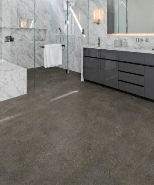 Sunlit Stone - 19/64" (7.5mm) - Swiss Techslate (MSunSt7.5) Luxury marble bathroom with waterproof Sunlit Stone brown-gray Techslate flooring and walk-in shower.
