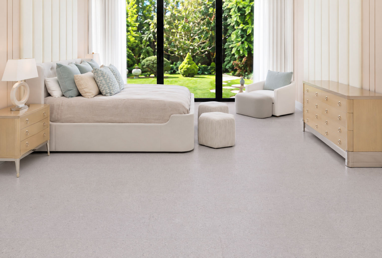 Sustainazzo - 25/64" (10mm) - Cork Floating (FSus10) Sustainazzo light-toned cork floor planks extend across a serene bedroom with garden windows and neutral furniture.