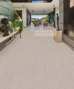 Luxury open hallway with light gray cork flooring, high ceilings, natural light, and contemporary architecture