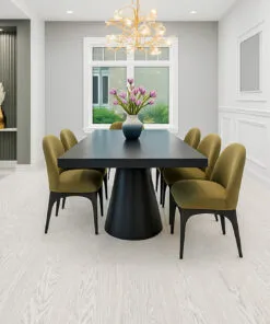 Modern dining room with Swiss Snow Cap real wood floating flooring, featuring a black pedestal table and olive-green chairs in a bright, elegant space.